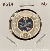 Reverse view in holder showing colourized aircraft design and denomination