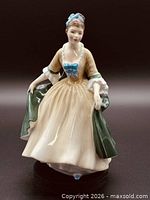 Front view of Royal Doulton Elegance figurine showing overall design and colors