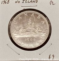 Front of holder showing reverse of 1968 Voyageur dollar