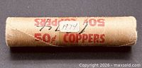 Side view of sealed paper roll showing printed text 50¢ Coppers