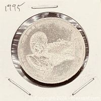 Obverse view of coin in 2x2 flip