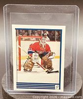 Front view of Patrick Roy sticker in protective sleeve