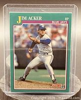 Card front showing player image, number, team, and brand
