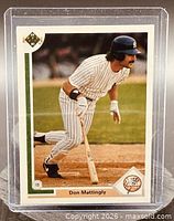 Front of Don Mattingly Upper Deck card in sleeve