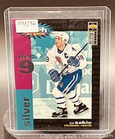 Front of 1995-96 Upper Deck Crash the Game Silver Joe Sakic card in holder