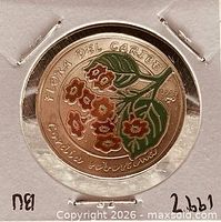 Obverse showing coloured Cordia sebestena flower design and inscriptions