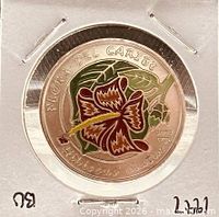 Reverse side showing Majagua flower and series text