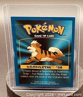 Front of Pokémon Game Tip Card #58 Growlithe in sleeve