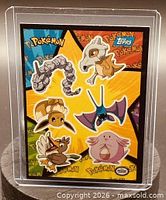 Front view of the card showing character stickers and logos