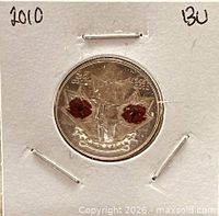 Colour obverse showing poppy design