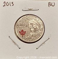 Reverse side showing Laura Secord design and coloured red maple leaf