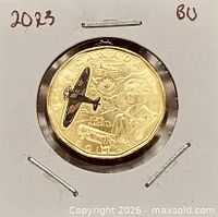 Reverse of 2023 coloured Elsie MacGill loonie in holder