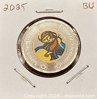 Full coin in holder displaying both metal tones and colour