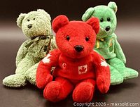 Group shot of all three collectible plush bears
