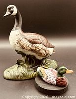 Front view of goose and mallard figurines together