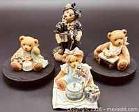 Group shot of four teddy bear figurines