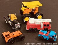 All five Tonka diecast vehicles grouped