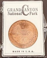 Medallion in plastic case with insert card