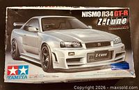 Box top showing Tamiya Nismo R34 GT-R Z-Tune artwork and branding