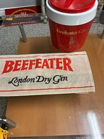 Ice bucket and bar towel together on counter