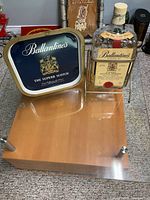 Tray and bottle side by side on surface