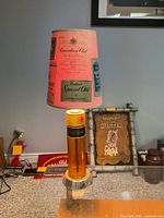 Full view of Hiram Walker bottle lamp with branded shade