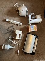 Top-down view of all items laid out on carpet