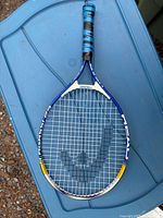 Full view of Head Ti. Agassi 23 tennis racket showing frame, strings and grip