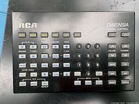 Remote showing full keypad labeled RCA Dimensia Digital Control