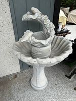Full view of resin fountain assembled on pedestal
