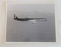 Full view of photograph showing CP Air jet in flight