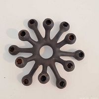 Top view showing twelve arms and central aperture