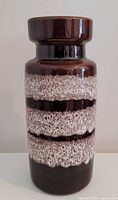 Full view of vase front showing glaze pattern