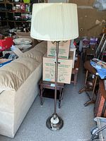 Full view of floor lamp with shade