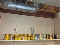 Full shelf view of all stain and polyurethane cans