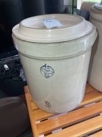 Full view of crock with lid showing size and overall glaze