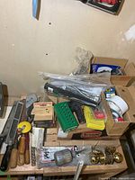 Overview of mixed tools and hardware on workbench