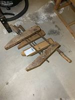 top view of three wooden clamps assembled