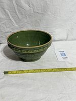 Full view of bowl with tape for scale