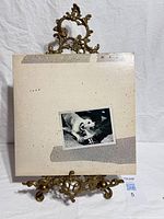 Front cover of Fleetwood Mac Tusk vinyl album on stand