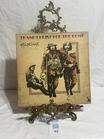 Front cover of album on stand