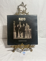 Front of Kiss Dressed To Kill LP jacket on stand