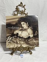 Front cover of Madonna Like A Virgin LP on stand