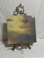 Front view of record sleeve on stand
