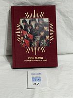 Front view of cloth-bound box set with album title and band photo