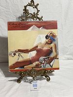 Front cover of Rolling Stones Made In The Shade LP on stand