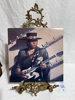Front cover of Texas Flood vinyl album on stand