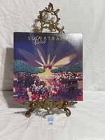 Front cover of Supertramp Paris album on display stand