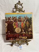 Front cover of vinyl LP on stand