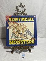 Front cover showing title Heavy Metal Monsters and illustration